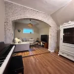 Reetdachkate Am Deich Hébergement de vacances
