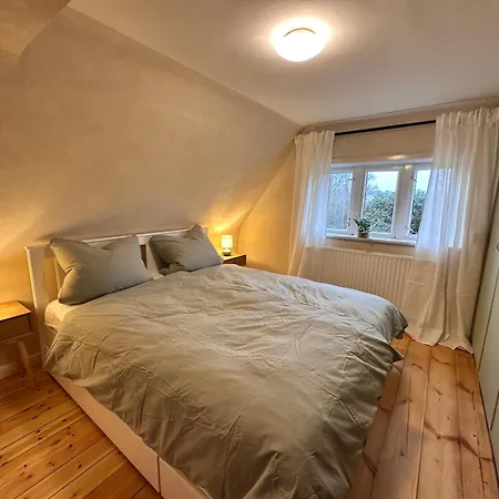 Reetdachkate Am Deich Ferienhaus *